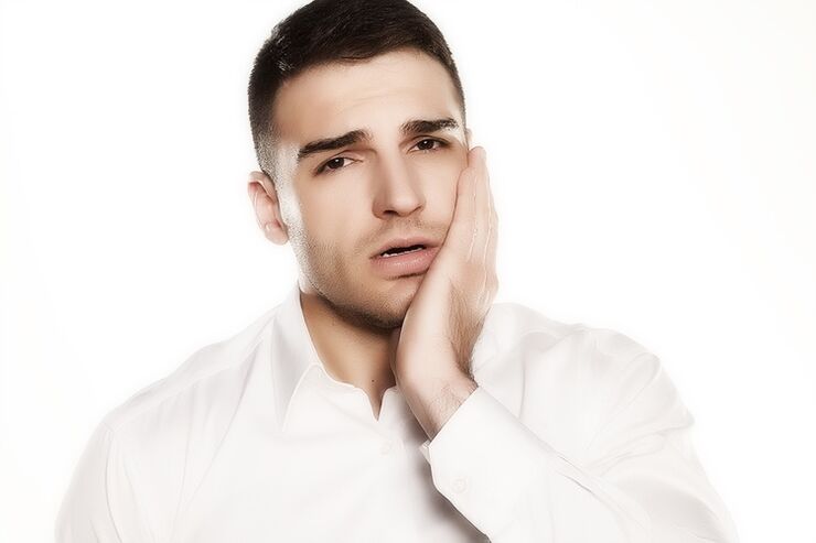 mal di denti e carie come cause di prostatite